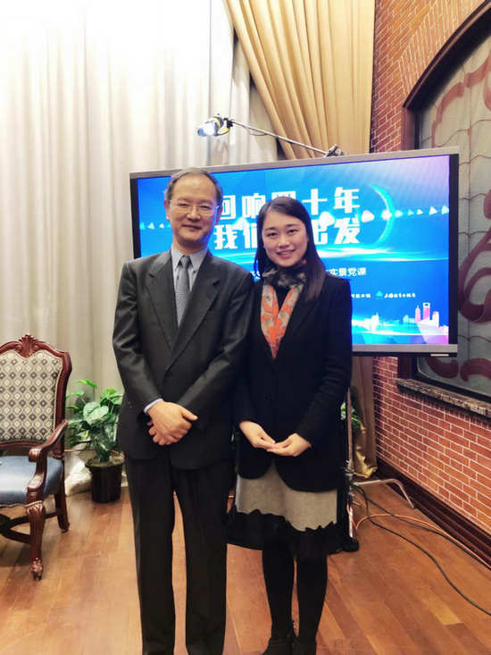 4.2018年11月8日，上交所首任總經(jīng)理尉文淵與沈霞在中國(guó)證券博物館參加改革開放“回響四十年，我們?cè)俪霭l(fā)”活動(dòng)后合影.jpg
